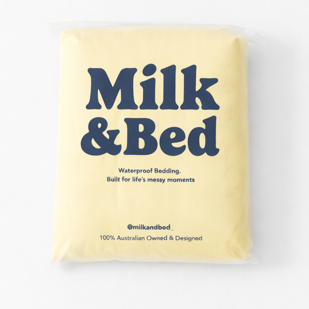 Yellow package with 'Milk & Bed' text on a white background
